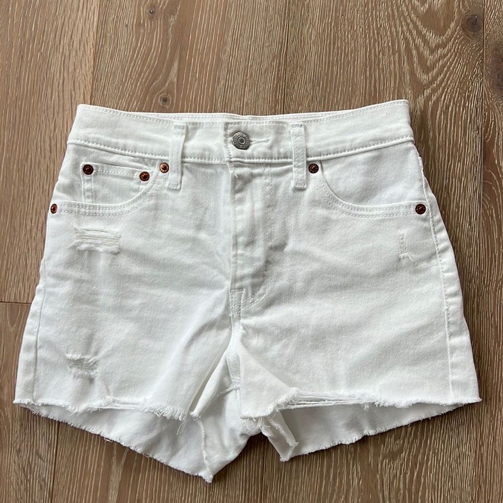 Levi’s high rise white denim shorts